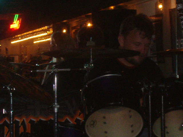 Lynn hammering on his drums. It's hard to get his pic in the back.
